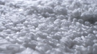 超级特写镜头白色毛巾的细节纺织品背景视频素材模板下载