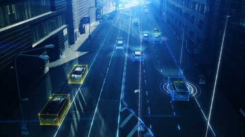 无人机拍摄自动驾驶汽车在城市中行驶视频素材模板下载