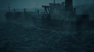 集装箱船在波涛汹涌的海上航行视频素材模板下载