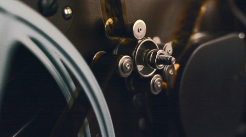电影放映机运输齿轮的滑块镜头