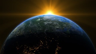 橙色的日出和地球上的阴影与宇宙中的恒星一起在太空中旋转视频素材模板下载