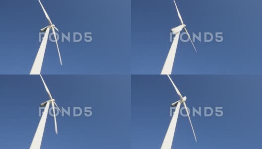 蓝天上的风力涡轮机高清在线视频素材下载