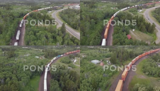 大火车在森林里行驶用无人机拍摄的航拍场景高清在线视频素材下载