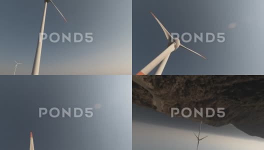 令人难以置信的空中fpv高速无人机拍摄风力涡轮机旋转。高清在线视频素材下载