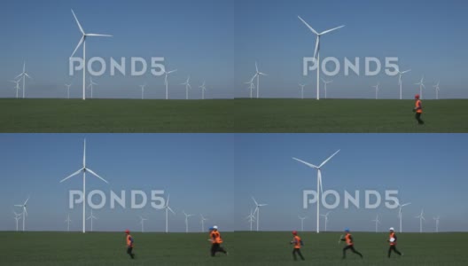 工程师运行风力涡轮机现场紧急时刻风车工程高清在线视频素材下载