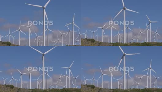 风力涡轮机场旋转的大型螺旋桨叶片用于发电高清在线视频素材下载