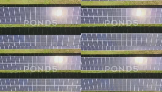 太阳直射下太阳能电池板的上升鸟瞰图，安排高清在线视频素材下载