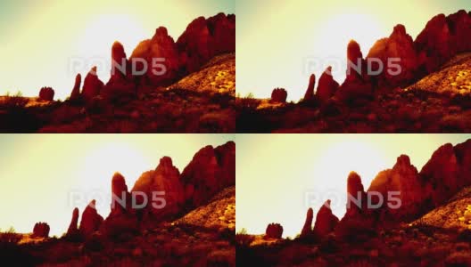 炙热的太阳照耀着岩峰，缓慢放大高清在线视频素材下载