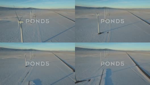 雪地中的空中风力涡轮机高清在线视频素材下载