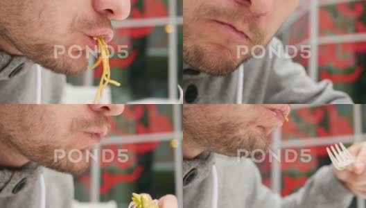 特写胡子男人嘴里吃咀嚼快餐中国意大利面和蔬菜高清在线视频素材下载