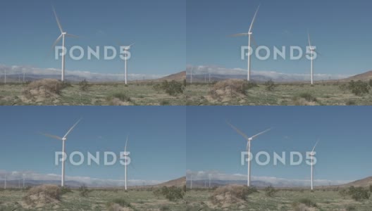 大型风力涡轮机旋转并产生可再生电力，在强风中运转高清在线视频素材下载