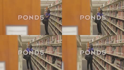 图书馆里的女大学生高清在线视频素材下载