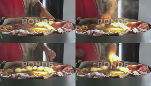 一个厨师为美味的墨西哥街头小吃玉米卷准备肉和玉米饼高清在线视频素材下载