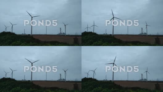 阴天的风力涡轮机高清在线视频素材下载