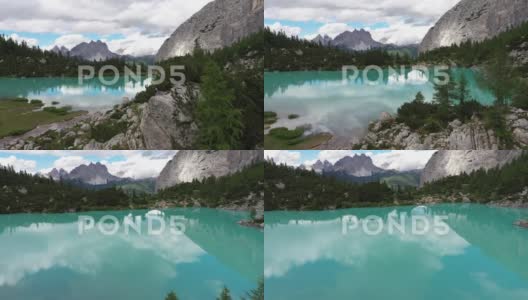 无人机飞行镜如蓝湖索拉皮斯，倒影山景云高清在线视频素材下载