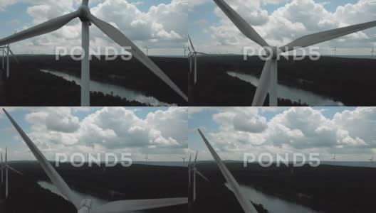 风力涡轮机的移动镜头，背景是其他人。高清在线视频素材下载