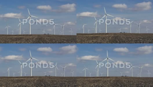 风力涡轮机大群-有积云的晴天高清在线视频素材下载