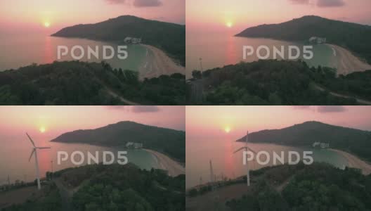 滑块式无人机拍摄的奈汉海滩和风力涡轮机在普吉岛南部高清在线视频素材下载