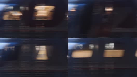 固定机位拍摄夜晚高速行驶中的火车车窗高清在线视频素材下载