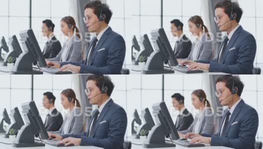 亚洲呼叫中心团队，穿着正式西装的客户服务和电话销售高清在线视频素材下载