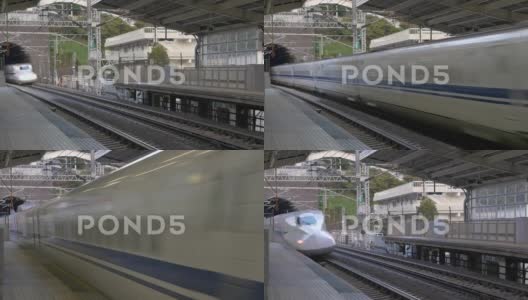 日本的新干线列车通过热海站高清在线视频素材下载