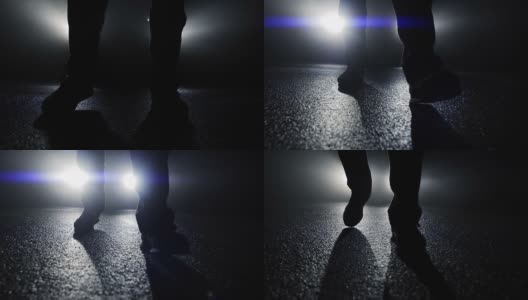 黑暗中正在走路脚的特写高清在线视频素材下载